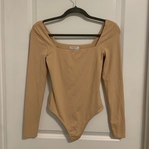 Long Sleeve Contour Bodysuit by Babaton